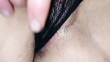 Masturbating