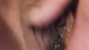 Masturbating