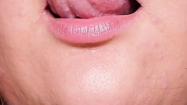 Fat girl sensually licks her plump lips