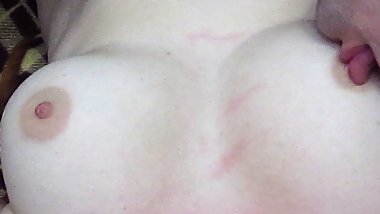 Husband licks his young wife's big natural tits and nipples