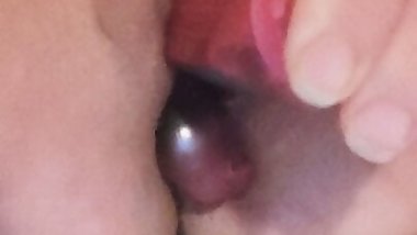 Masturbating