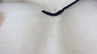 Husband licks his young wife's big natural tits and nipples