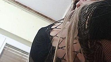 Susi sitting above in black fishnet tits