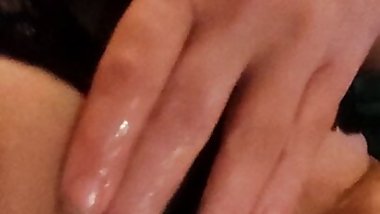 Masturbating