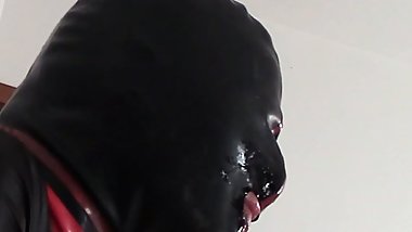 Teaser Laura hooded in a very close view of a great blowjob action with ring gag and huge cum swallow