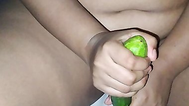 Desi single girl gets sexually excited and has sex with cucumber