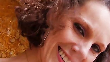 Brunette milf does anal sex and deep blowjob in the cave
