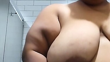 Dumb pigslut punches her saggy udders