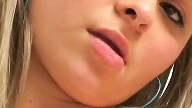Petite teen masturbates in solo session