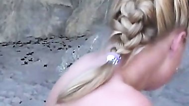 Solo teen fingering her pussy outdoors