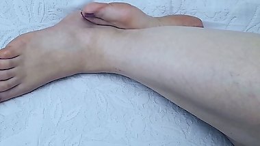 Another perspective, Anna looks beautiful in bed with bare feet.